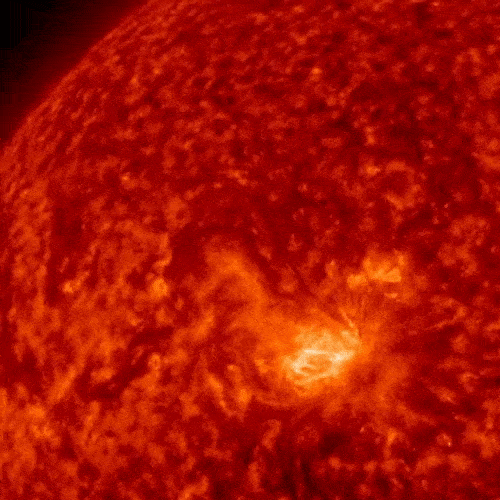 A red quarter of a circle shows a sun filament exploding.