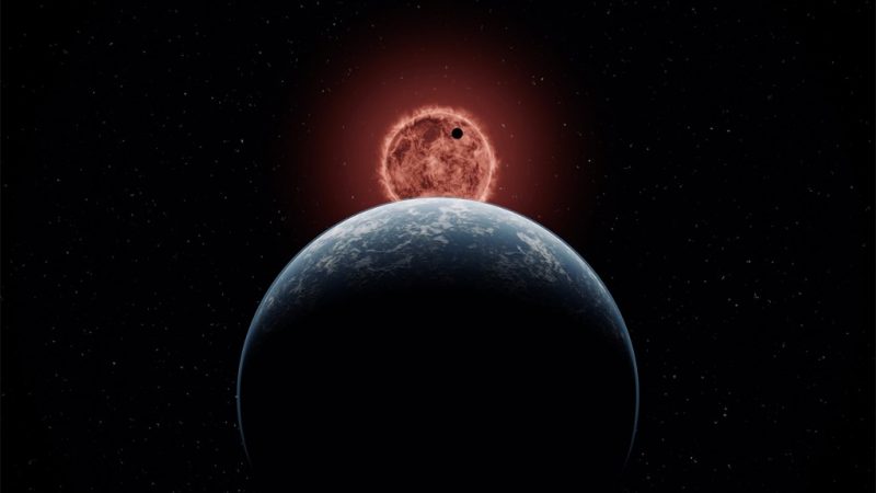 Super-Earth and mini-Neptune: Blue planet seen from behind, with smaller planet transiting red sun in distance.