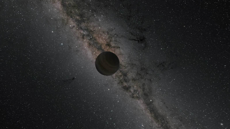 Captured planet: Dimly-lit planet floating in space against background of Milky Way.
