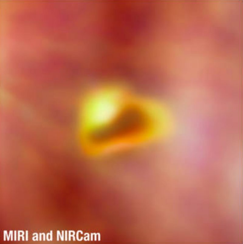 Life's building blocks: Blurry image of a yellow star, with a disk.