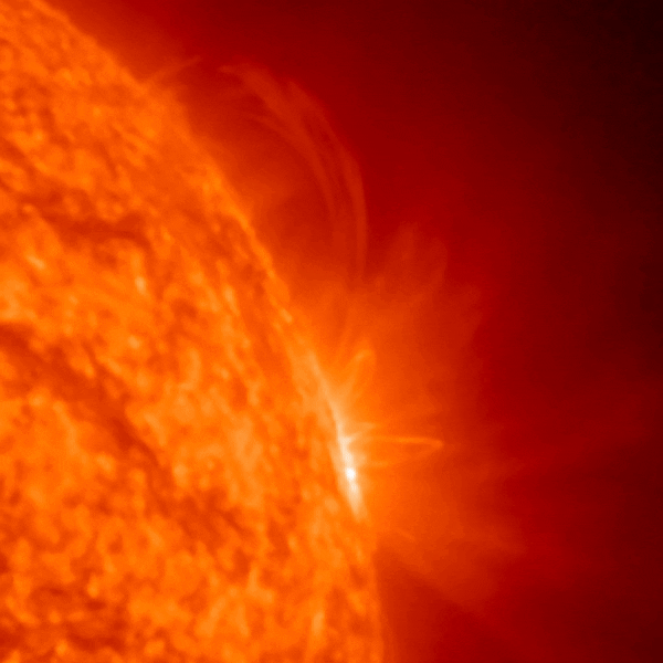 A red quarter of a circle shows the northeast sun with explosions.
