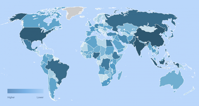World map, in shades of blue, with darkest blue indicating higher population.