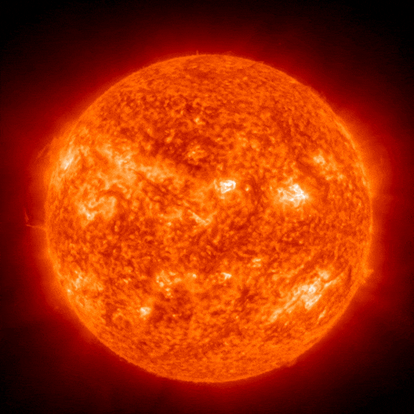 Short animation of entire glowing yellow and orange sun with thready prominences visible at edges.