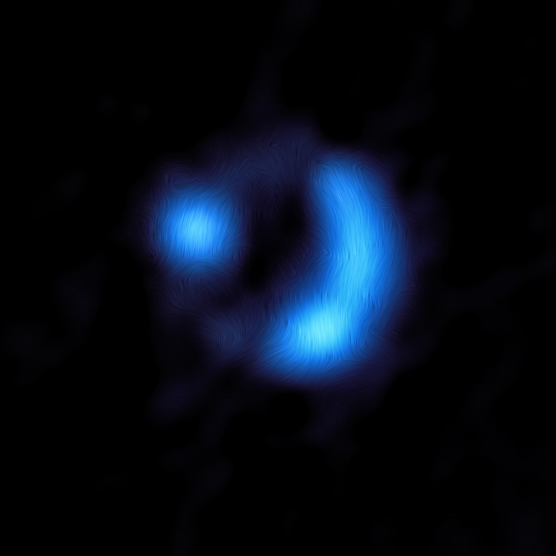 Galactic magnetic field: Partial ring of blue wavy light with 2 bright spots along the ring.