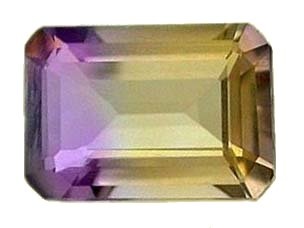 A faceted rectangular gemstone purple at one end fading into yellow at the other end.