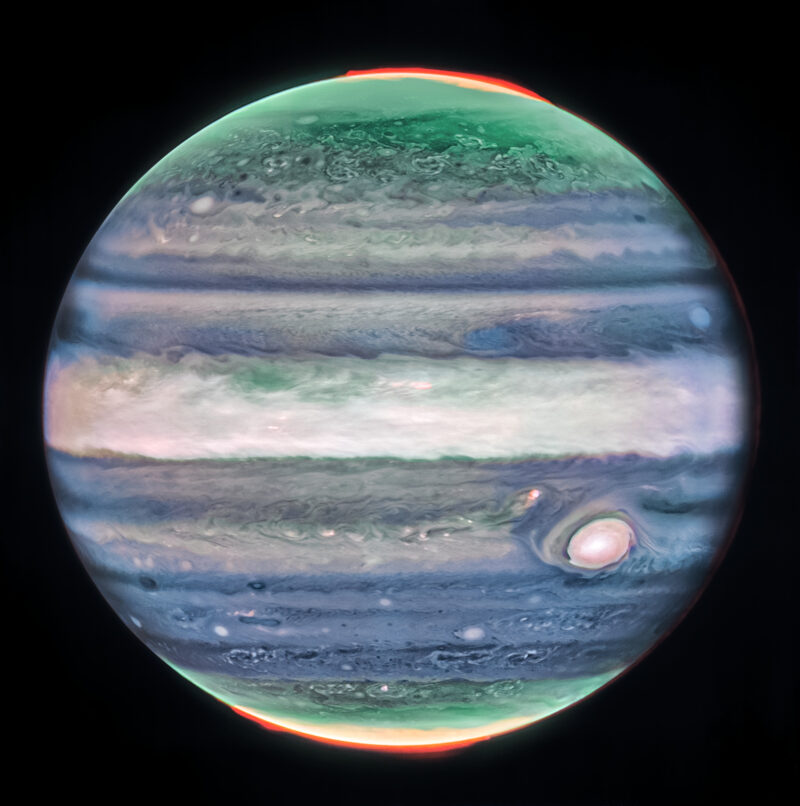 Dark matter collisions: Jupiter with green and blue bands and a pale wide stripe at center plus a large, pale spot.