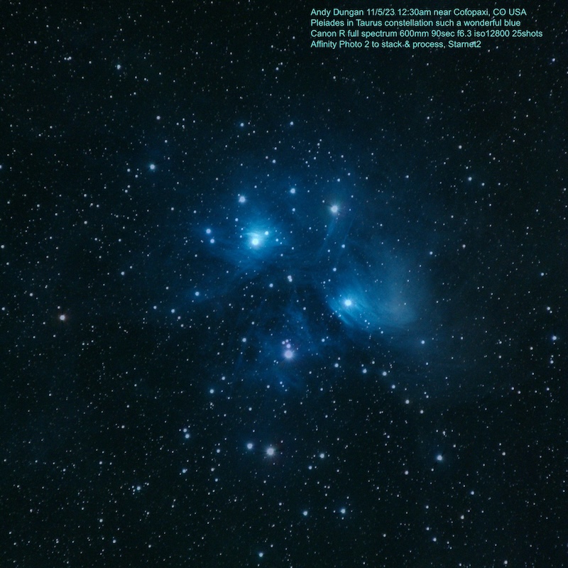 Bright bluish stars with bluish nebula around them showing the Pleiades star cluster.