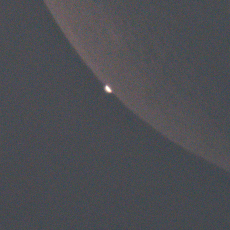 Photos of Venus and the moon: A bright light pokes out from behind the dimmer edge of the moon.