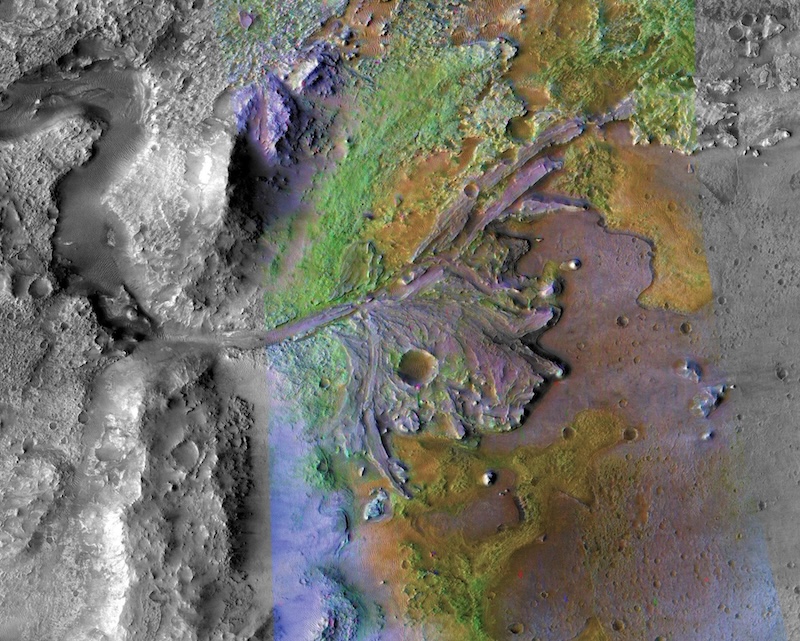 Perseverance rover: View from above of rugged landscape with various colors and branching, river-like formation in the center.