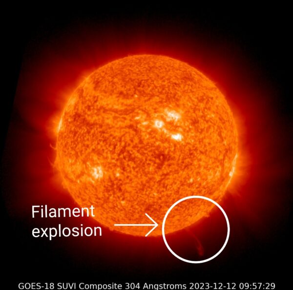 Spacecraft image of sun, with circle around place where solar plasma is lifting into space.