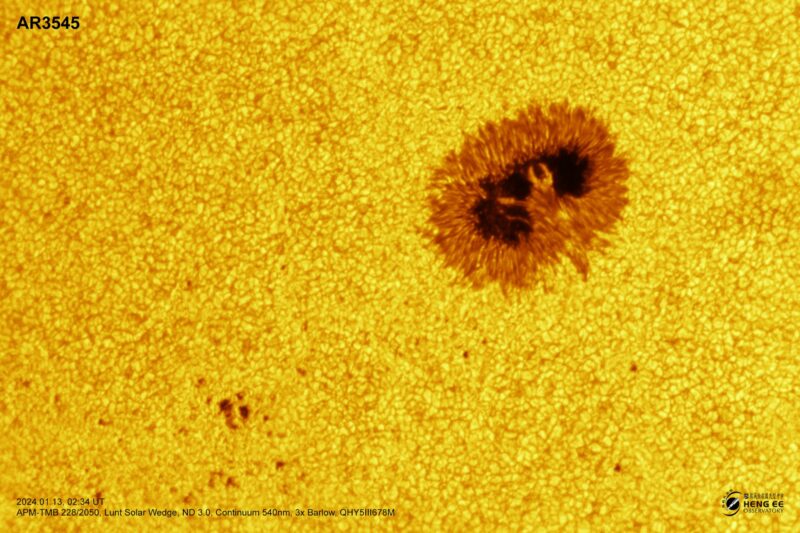 A sun close-up, seen as a flat yellow surface with a mottled surface.