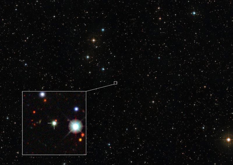 Star field with a square inset containing a very bright objct with some other bright objects.