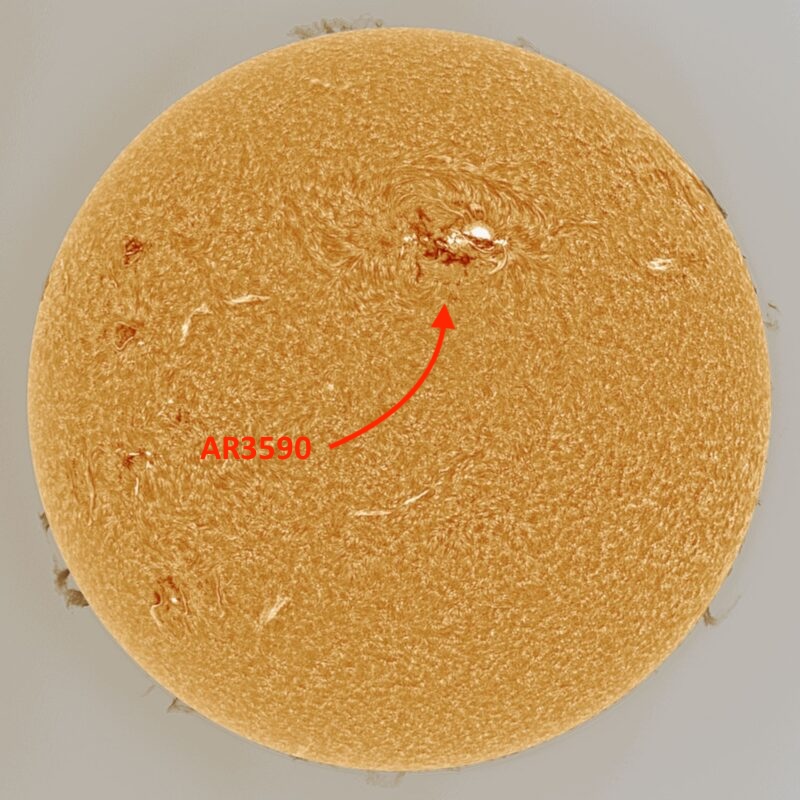 Yellow sphere with a big white splotch at the top, labeled AR3590, with an arrow.