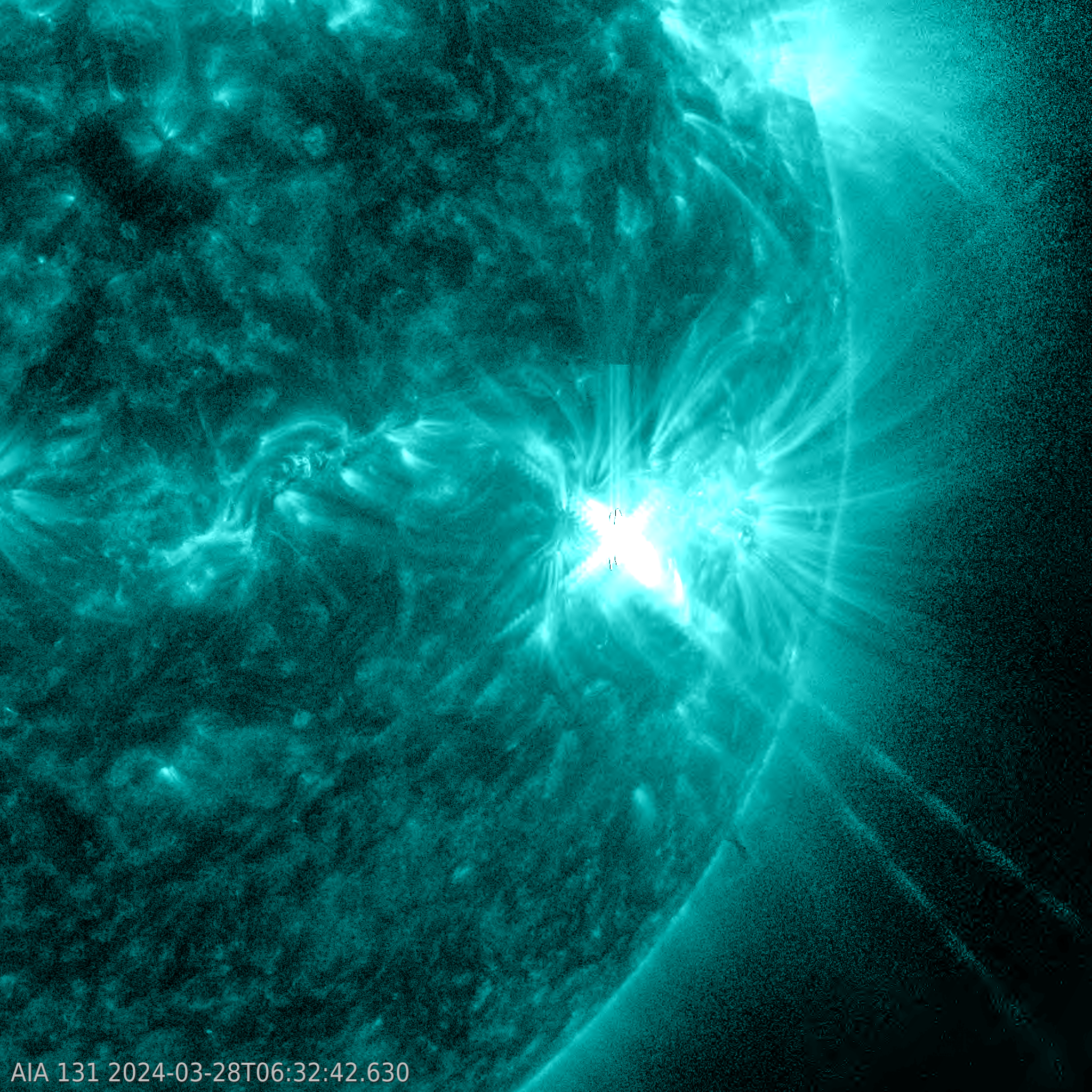 Close up image of the sun, pictured blue, showing active sunspot AR3615 releasing an M flare.