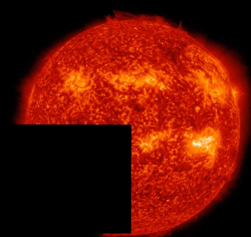 An orange sun with the lower left side showing a black box instead of sun.