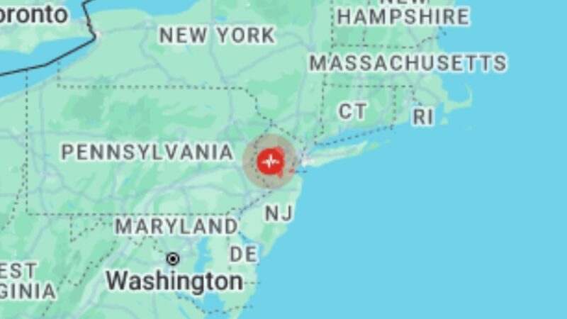 Image shows map of part of New England with a large red dot indicating the epicenter of a large earthquake in New Jersey.