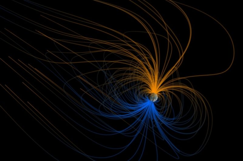 Long arcing lines from the North Pole and South Pole of Earth, representing the magnetic field.