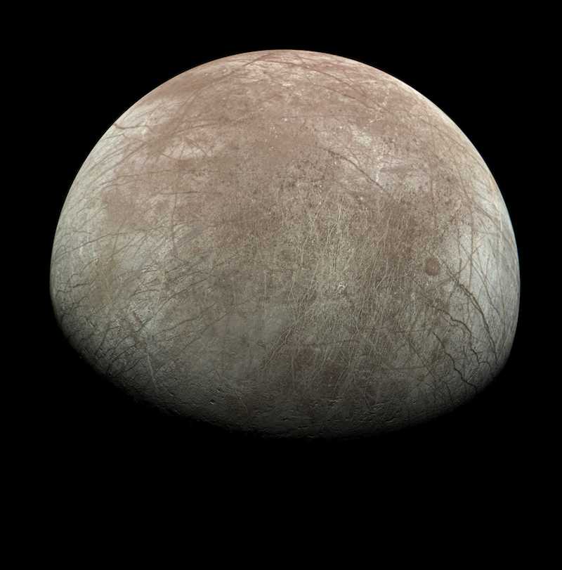 Images of Europa: Grayish-brown planet-like object with many long cracks on its surface, on black background.