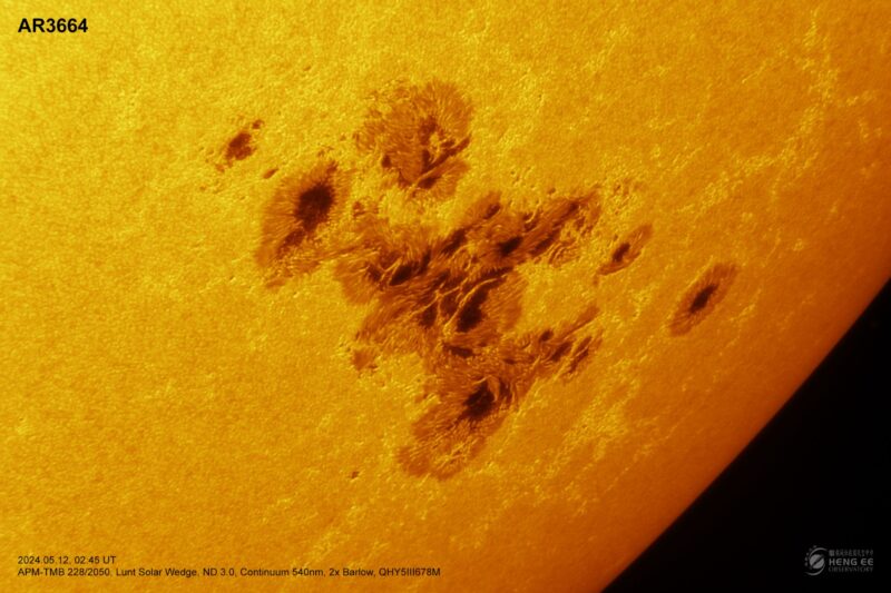 A sun close-up, seen as a sectional yellow sphere with a mottled surface.