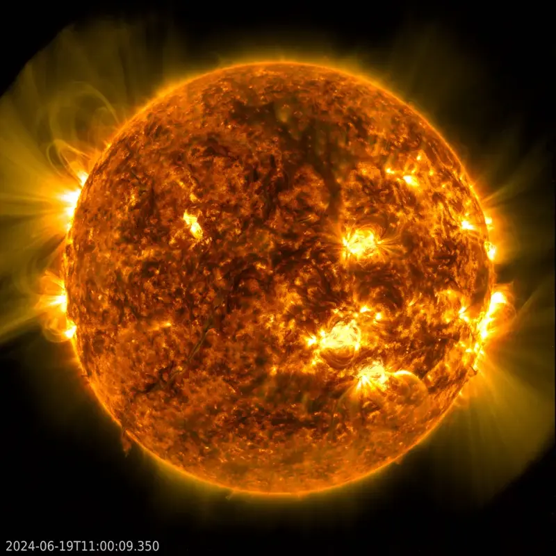 Animation of spacecraft image of full orange ball of sun.
