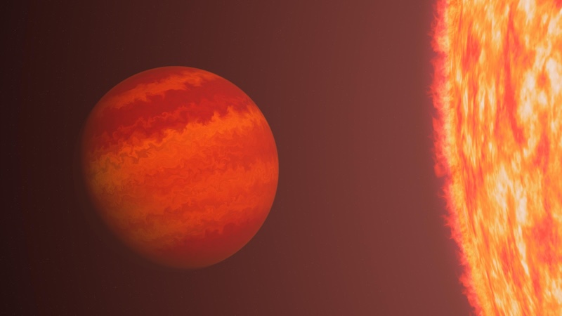 Exoplanet's puffy atmosphere: Reddish sphere with horizontal bands near edge of larger bright molten-looking sphere.