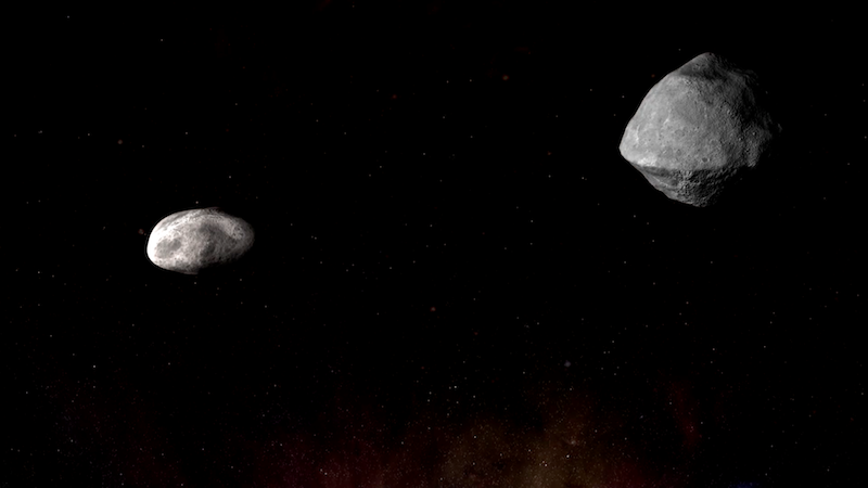 Egg-shaped rocky object on left and larger walnut-shaped rocky object on right, on black background.