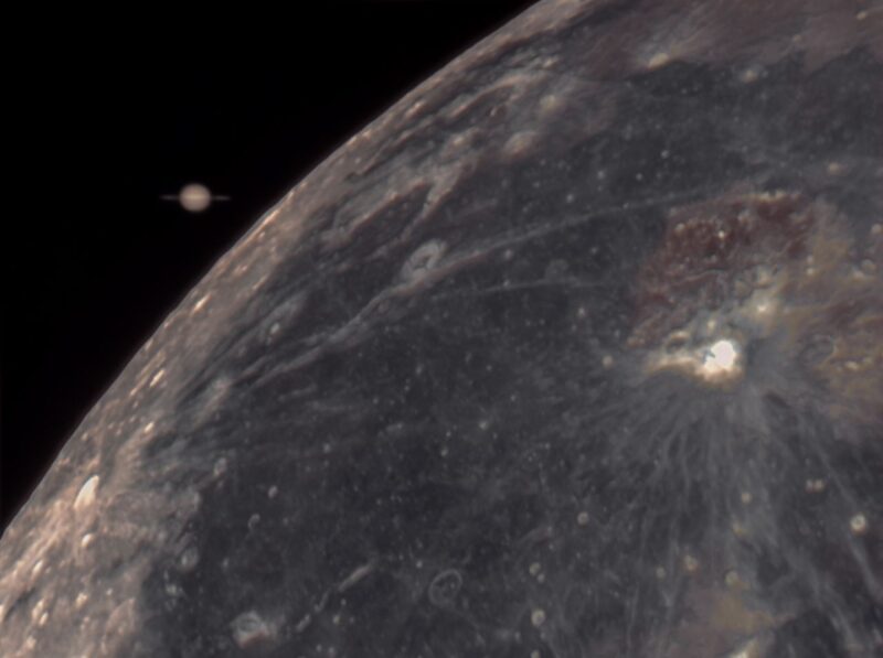 Moon and Satur: Top left of a dark gray sphere. There is a small, brownish sphere to its left that has a ring around.