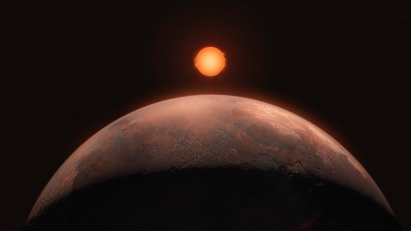 Barnard's Star: Brown rocky planet with a bright reddish sun above in the distance.