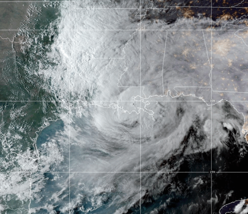 Satellite image of the Gulf with a big swirl of clouds centered over southern Louisiana.