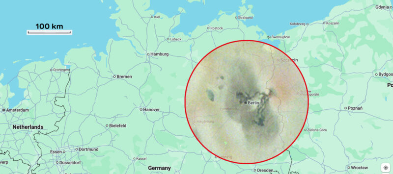 A red circle with an image of an Io volcano, superimposed over a map of Europe, centered on Berlin, its edge reaching almost to Dresden.