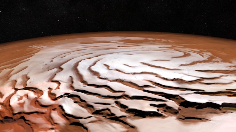 Mars' polar caps: Spiraling formation of white ridges and dark valleys on surface of reddish planet.