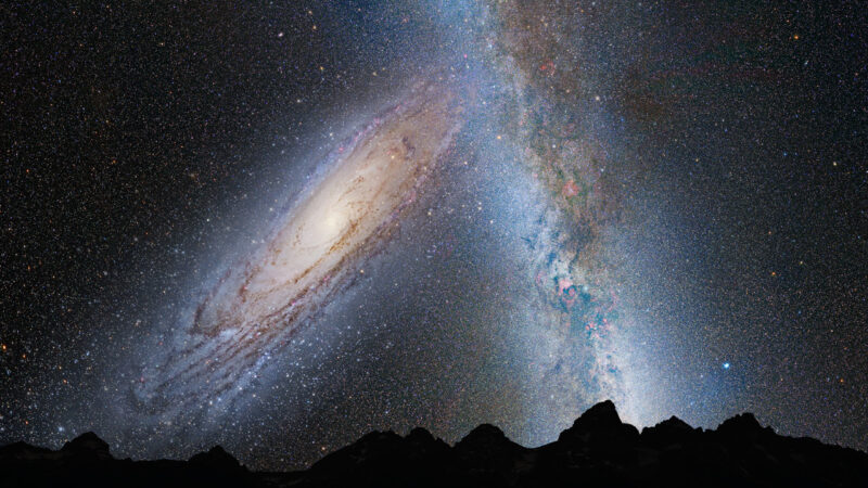 Night sky with a huge, bright oblique swirl of stars (Andromeda Galaxy) next to a cloudy band of the Milky Way.