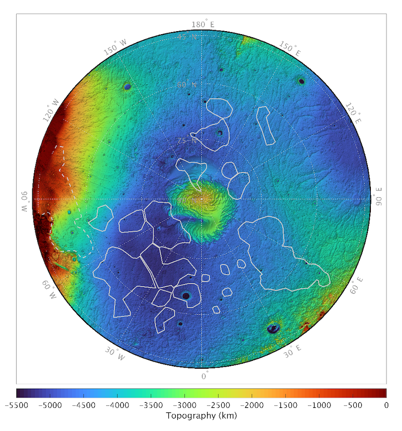 Circle, mostly blue, with reddish and brownish colors in the center and on left and lower right. Irregular shapes with white outlines on blue area. Color gradient bar and text label at the bottom.