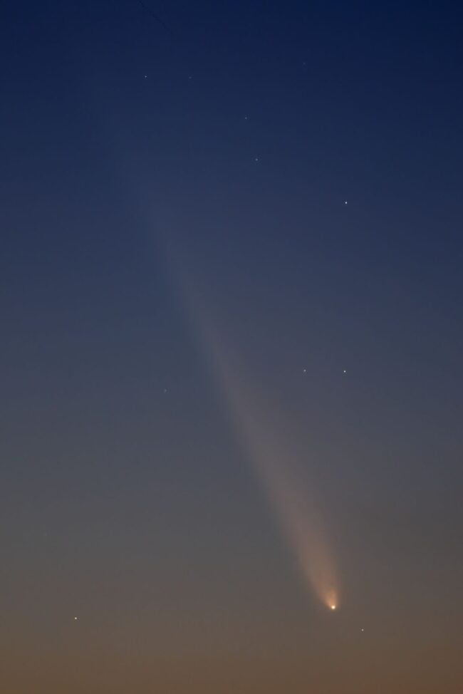 A comet with the head at lower right and tail extending to upper left.