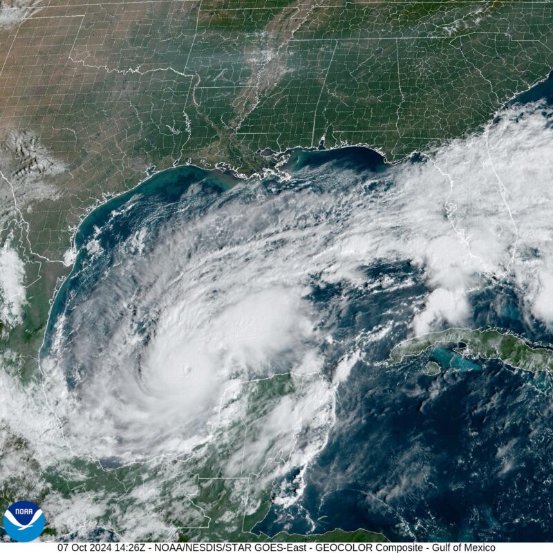 Satellite image of Gulf of Mexico with hurricane Milton near Yucatan Peninsula and clouds taking up much of the gulf.