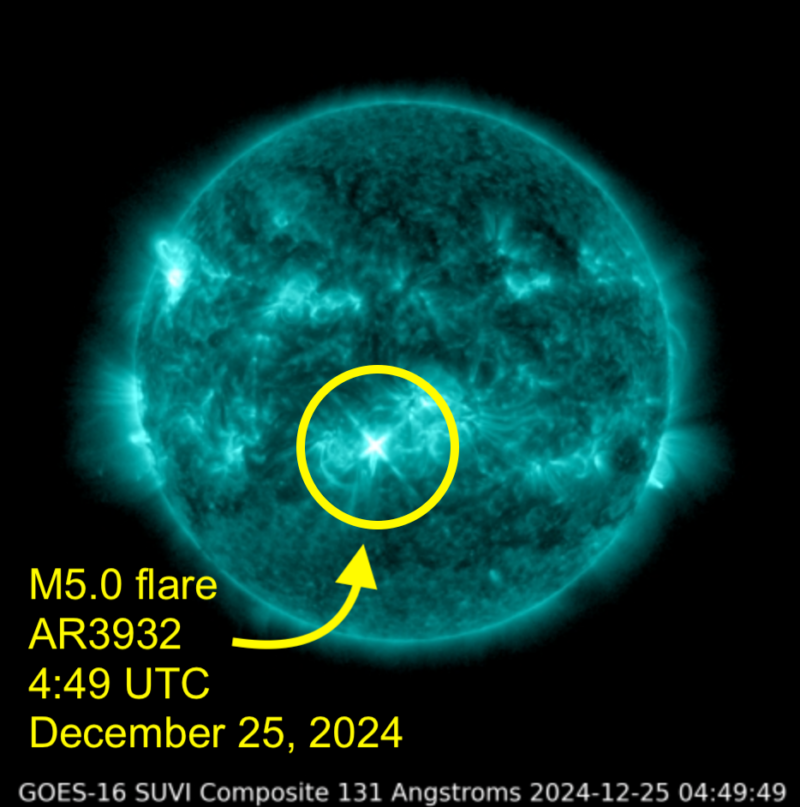 The sun, covered in dark and light patches, with one small bright explosion labeled M5 flare.