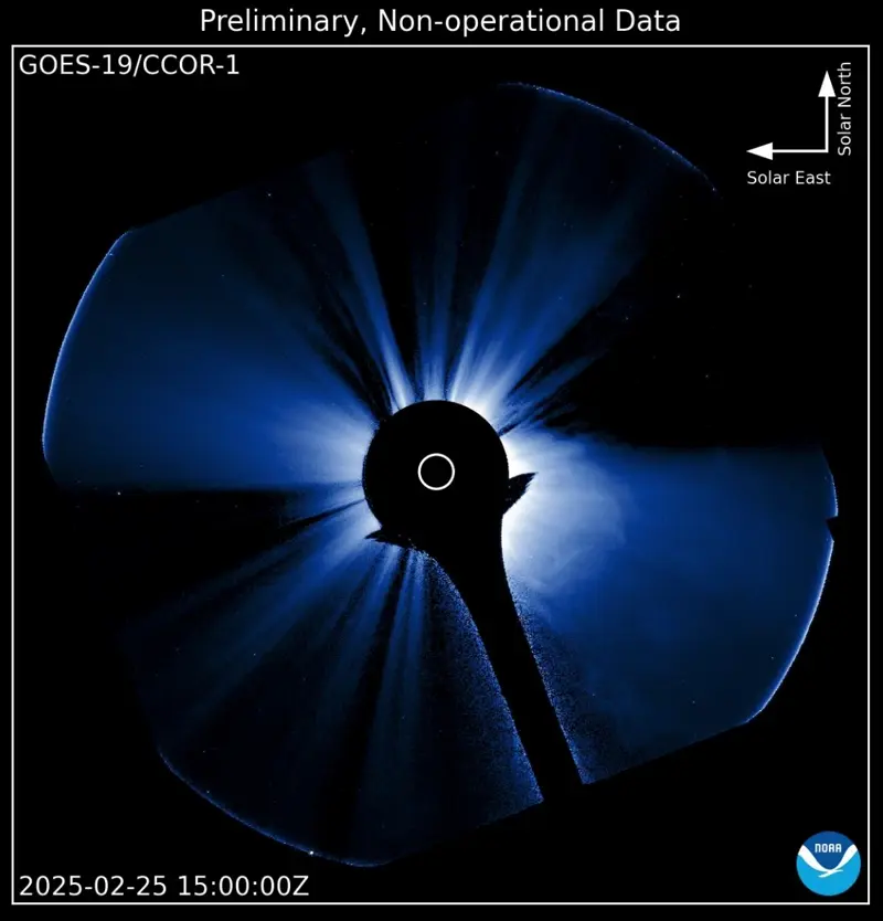 A black circle with blue light streaming from it in plumes.