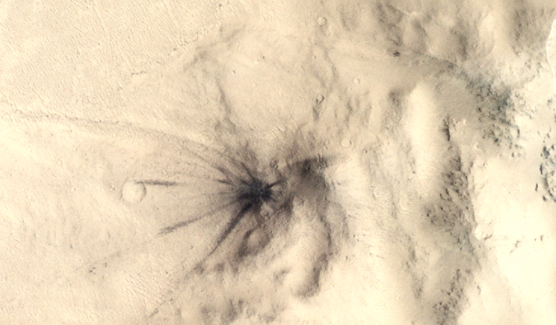 Dark starburst rays emanate from a central region on a lumpy white background.