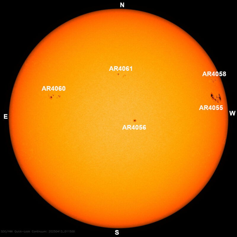 The sun, seen as a large yellow sphere with dark spots, each labeled.