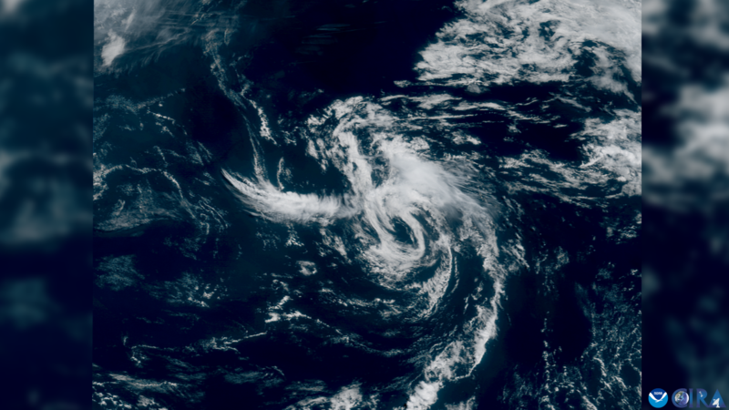 A white swirl of clouds over a dark blue Atlantic Ocean shows an unimpressive, but still beautiful Tropical Storm Andrea.