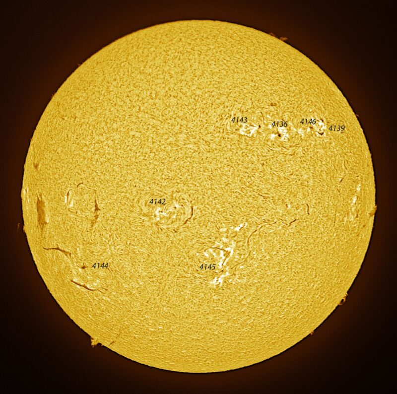 The sun, seen as a large yellow sphere with a mottled surface.