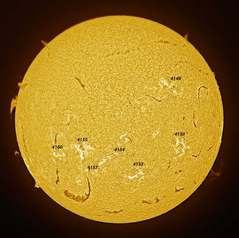 The sun, seen as a large yellow sphere with a mottled surface.