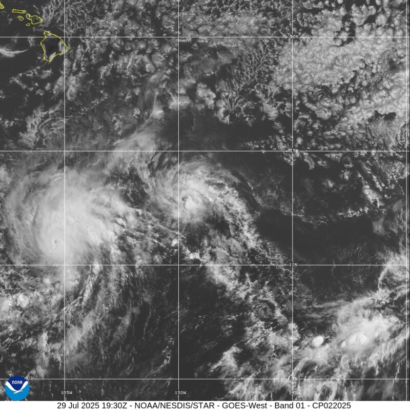 Hurricane Iona swirls on the left side of the image, a small eye visible. To the right is a smaller swirl, Tropical Storm Keli.