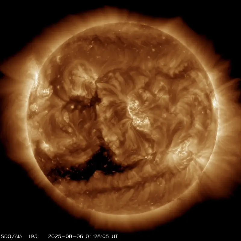 Brownish sun spinning with active regions bubbling.