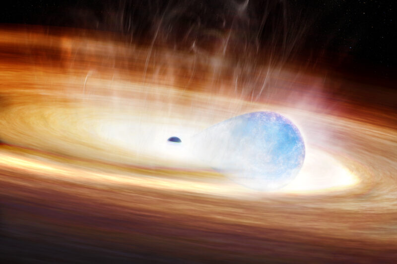 New type of supernova: A smaller, black sphere at center surrounded by a large, bright disk with a big blue sphere in it.