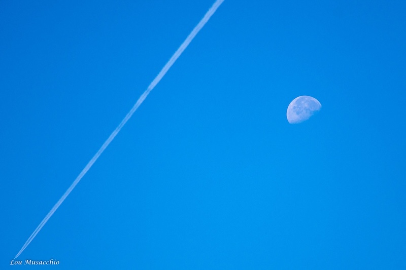 Daytime waning gibbous moon.