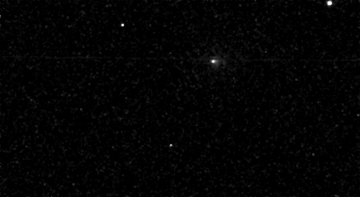 Comet 3I/ATLAS: A fuzzy white object moving against the background stars.