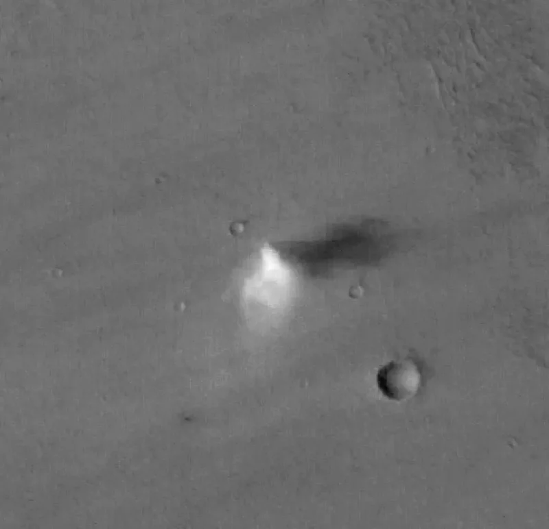 Animation of a dust devil viewed from above on a gray surface with a few craters.