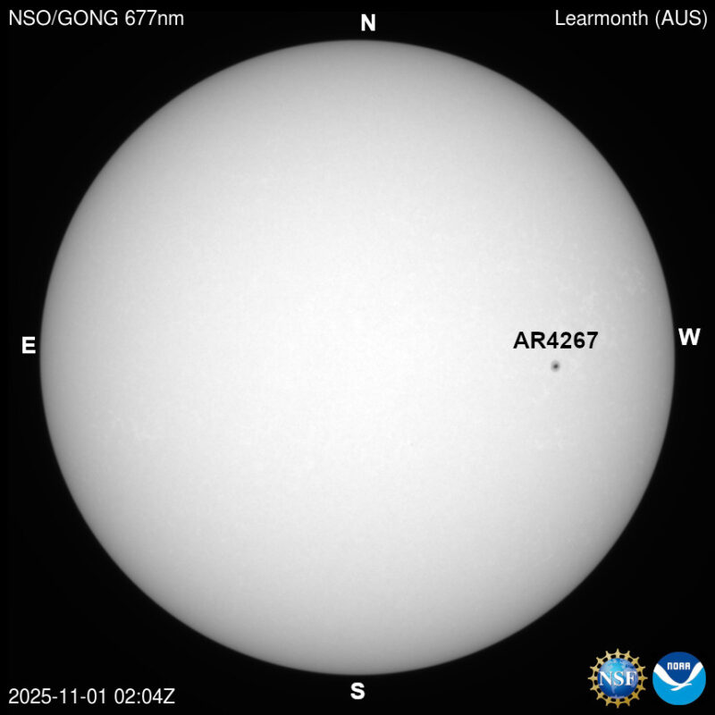 The sun, seen as a large white sphere with dark spots, each labeled.