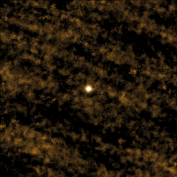 A bright point of light at center with streaks moving past.